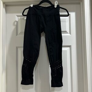 Peek-a-Boo netted cropped leggings by FP Movement.